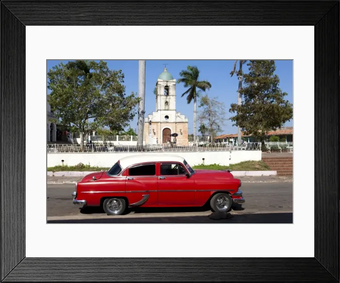 Framed Print : Classic red American car parked by the old square in Vinales village, Pinar del Rio Framed Print : Classic red American car parked by the old square in Vinales village, Pinar del Rio
