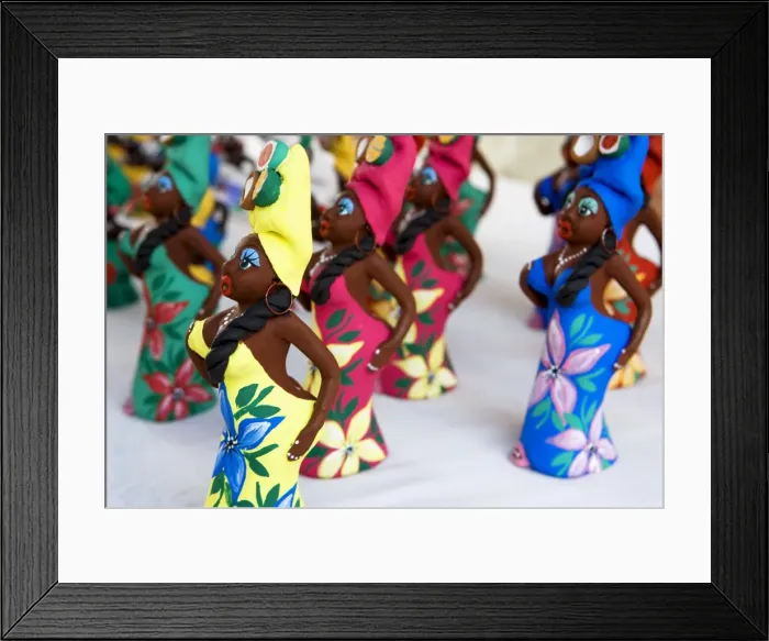 Framed Print : Souvenir traditional Cuban lady statues for sale in craft market in Trinidad