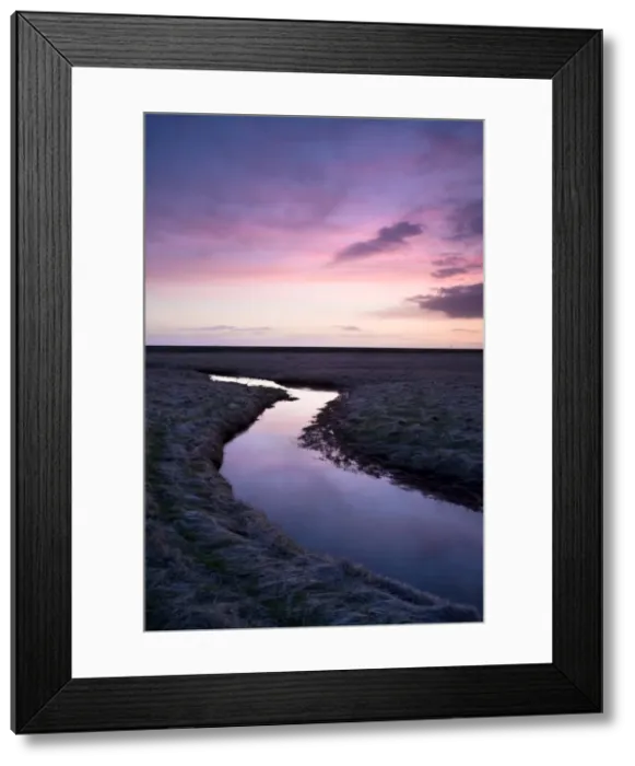 Framed Print : Stream meandering into the distance and reflecting colours in the twilight sky Framed Print : Stream meandering into the distance and reflecting colours in the twilight sky