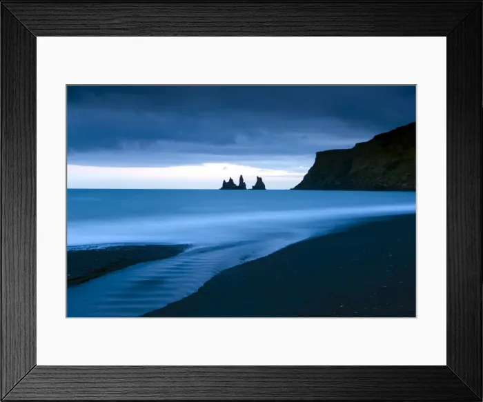 Framed Print : Twilight view towards rock stacks at Reynisdrangar off the coast at Vik Framed Print : Twilight view towards rock stacks at Reynisdrangar off the coast at Vik