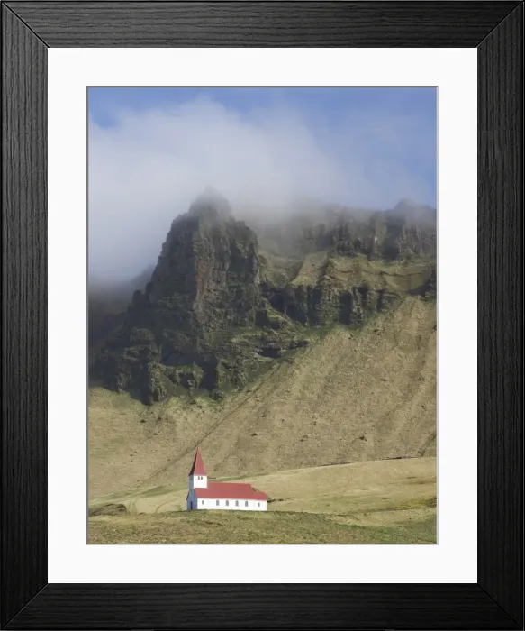 Framed Print : Icelandic church dwarfed by mountains rising into mist, Vik i Myrdal, South Iceland Framed Print : Icelandic church dwarfed by mountains rising into mist, Vik i Myrdal, South Iceland