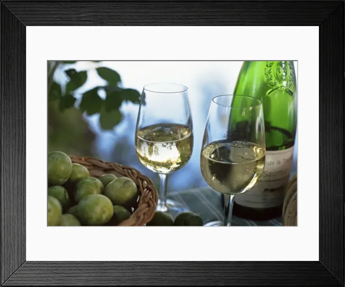Framed Print : Glasses of white wine on table with river relected in glass, Loire, France, Europe Framed Print : Glasses of white wine on table with river relected in glass, Loire, France, Europe