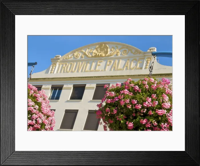 Framed Print : Flowers and facade of the Trouville Palace Hotel, now turned into apartments Framed Print : Flowers and facade of the Trouville Palace Hotel, now turned into apartments