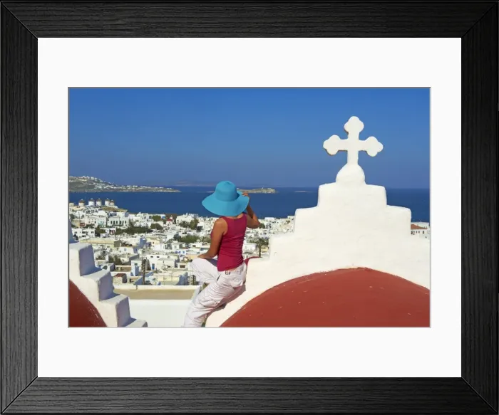 Framed Print : Tourist on roof of red church above the old town, Mykonos town, Chora, Mykonos Framed Print : Tourist on roof of red church above the old town, Mykonos town, Chora, Mykonos