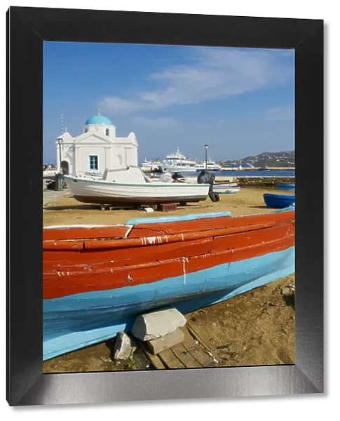 White chapel with blue dome, harbour and boats, Hora, Mykonos, Cyclades