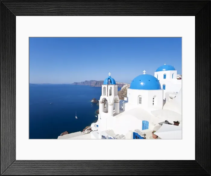 Framed Print : Blue domed churches in the village of Oia, Santorini (Thira), Cyclades Islands Framed Print : Blue domed churches in the village of Oia, Santorini (Thira), Cyclades Islands