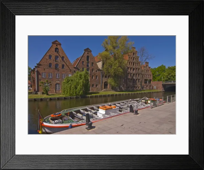 Framed Print : Boat on a little channel in front of the salt warehouses, Lubeck, UNESCO World Heritage Site Framed Print : Boat on a little channel in front of the salt warehouses, Lubeck, UNESCO World Heritage Site