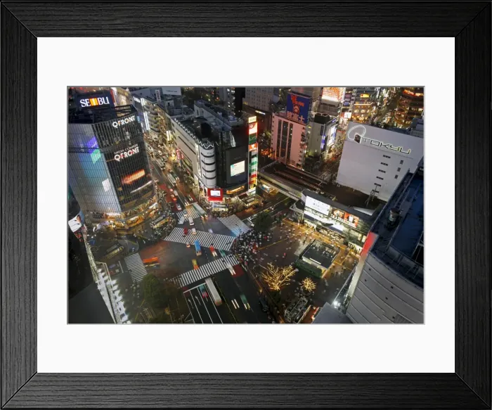 Framed Print : Crowds crossing the famous Shibuya Crossing crosswalks at the centre of Shibuyas fashionable shopping and entertainment district. Shibuya, Tokyo Framed Print : Crowds crossing the famous Shibuya Crossing crosswalks at the centre of Shibuyas fashionable shopping and entertainment district. Shibuya, Tokyo