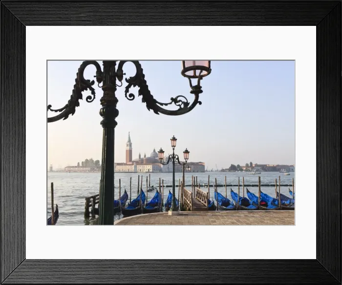 Framed Print : Gondolas moored on the Lagoon, San Giorgio Maggiore beyond, Riva degli Schiavoni Framed Print : Gondolas moored on the Lagoon, San Giorgio Maggiore beyond, Riva degli Schiavoni