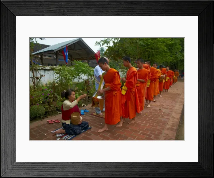 Framed Print : Procession of Buddhist monks collecting alms and rice at dawn, Luang Prabang Framed Print : Procession of Buddhist monks collecting alms and rice at dawn, Luang Prabang