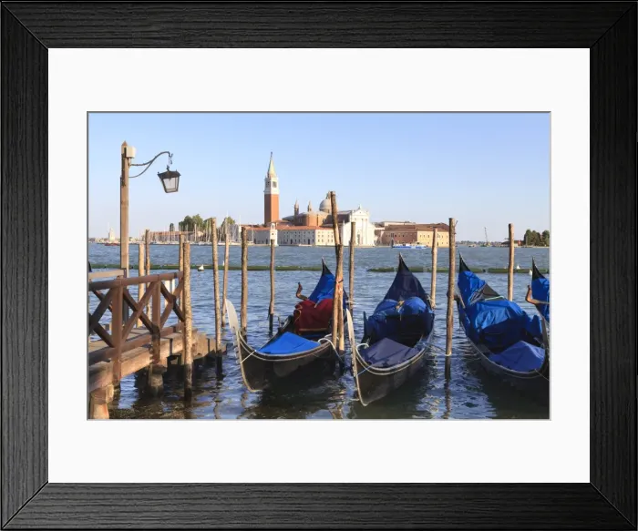 Framed Print : Gondolas moored on the Lagoon, San Giorgio Maggiore beyond, Riva degli Schiavoni Framed Print : Gondolas moored on the Lagoon, San Giorgio Maggiore beyond, Riva degli Schiavoni