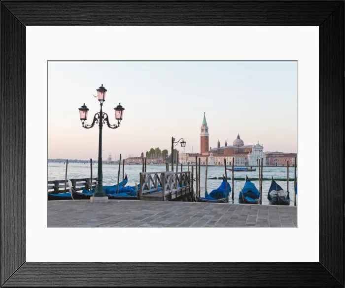 Framed Print : Gondolas moored on the Lagoon, San Giorgio Maggiore beyond, Riva degli Schiavoni Framed Print : Gondolas moored on the Lagoon, San Giorgio Maggiore beyond, Riva degli Schiavoni