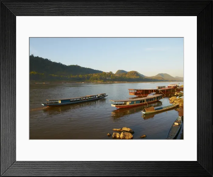 Framed Print : Tourist boats at sunset on the Mekong River, Luang Prabang, Laos, Indochina Framed Print : Tourist boats at sunset on the Mekong River, Luang Prabang, Laos, Indochina