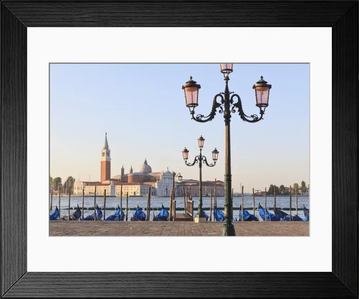 Framed Print : Gondolas moored on the Lagoon, San Giorgio Maggiore beyond, Riva degli Schiavoni Framed Print : Gondolas moored on the Lagoon, San Giorgio Maggiore beyond, Riva degli Schiavoni