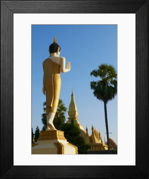 Framed Print : Large standing Buddha statue, Pha That Luang temple, Vientiane, Laos, Indochina Framed Print : Large standing Buddha statue, Pha That Luang temple, Vientiane, Laos, Indochina