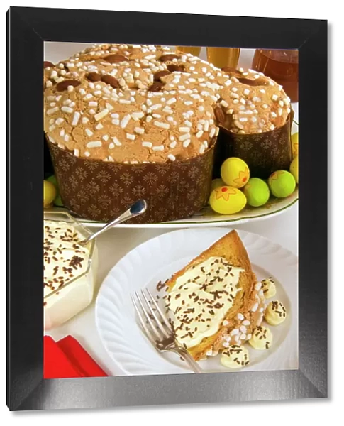 Colomba cake (dove cake) with cream sauce, an Italian speciality for Easter Day