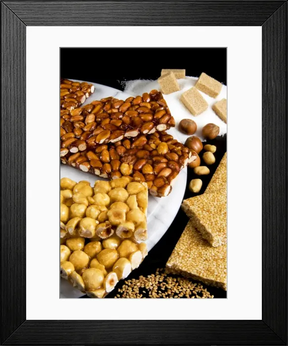 Framed Print : Croccante, a nut crisp sweet typical of many areas of Italy, made from sugar and almonds Framed Print : Croccante, a nut crisp sweet typical of many areas of Italy, made from sugar and almonds