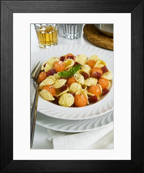 Framed Print : Orecchiette pasta with melon ball, prosciutto (ham), parmesan cheese and basil Framed Print : Orecchiette pasta with melon ball, prosciutto (ham), parmesan cheese and basil