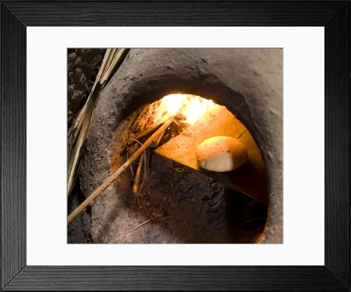 Framed Print : Freshly-baked bread in a traditional communal clay oven in the town of Merzouga Framed Print : Freshly-baked bread in a traditional communal clay oven in the town of Merzouga
