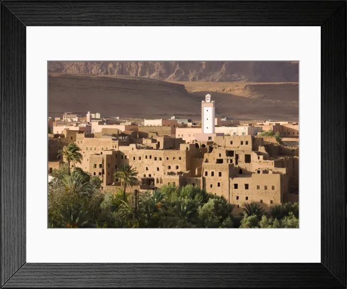 Framed Print : View over the town of Tinerhir showing crumbling kasbahs, palm groves and a modern minaret