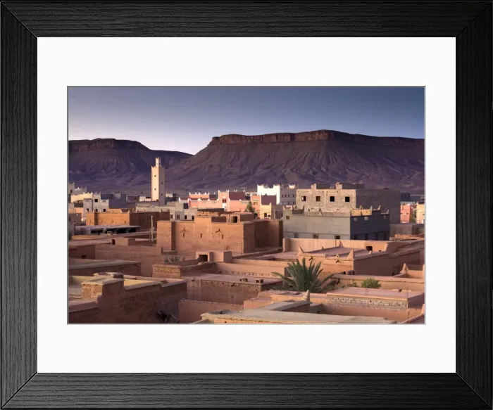 Framed Print : View over town of Nkob bathed in morning sunlight with modern minaret in the distance Framed Print : View over town of Nkob bathed in morning sunlight with modern minaret in the distance