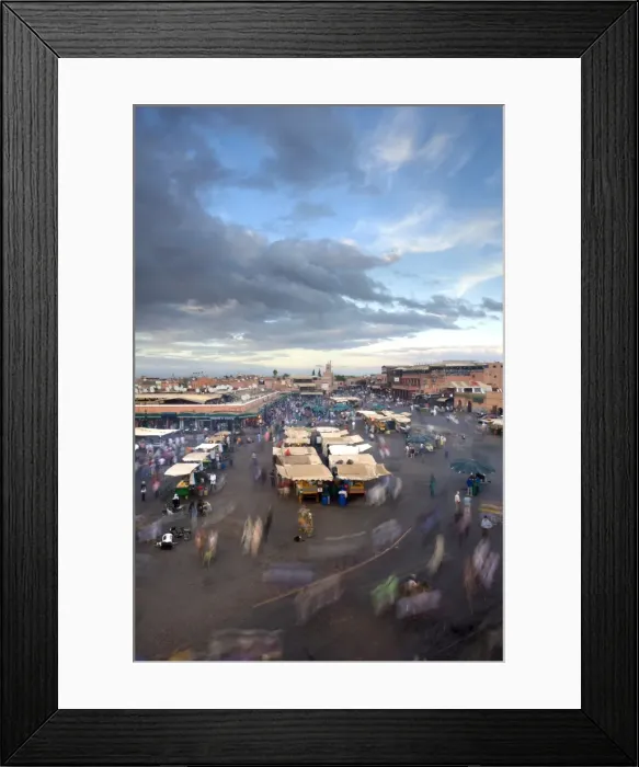 Framed Print : View over Djemaa el Fna at dusk with foodstalls and crowds of people, Marrakech Framed Print : View over Djemaa el Fna at dusk with foodstalls and crowds of people, Marrakech