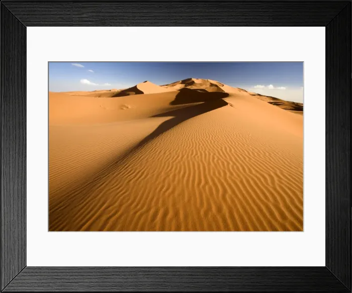Framed Print : Rolling orange sand dunes and sand ripples in the Erg Chebbi sand sea near Merzouga Framed Print : Rolling orange sand dunes and sand ripples in the Erg Chebbi sand sea near Merzouga