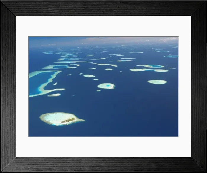 Framed Print : Aerial view of atolls and islands in The Maldives, Indian Ocean, Asia Framed Print : Aerial view of atolls and islands in The Maldives, Indian Ocean, Asia