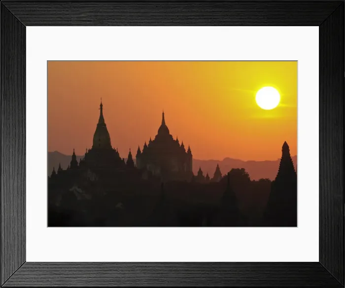 Framed Print : Silhouettes of the temples and pagodas of the ruined town of Bagan at sunset Framed Print : Silhouettes of the temples and pagodas of the ruined town of Bagan at sunset