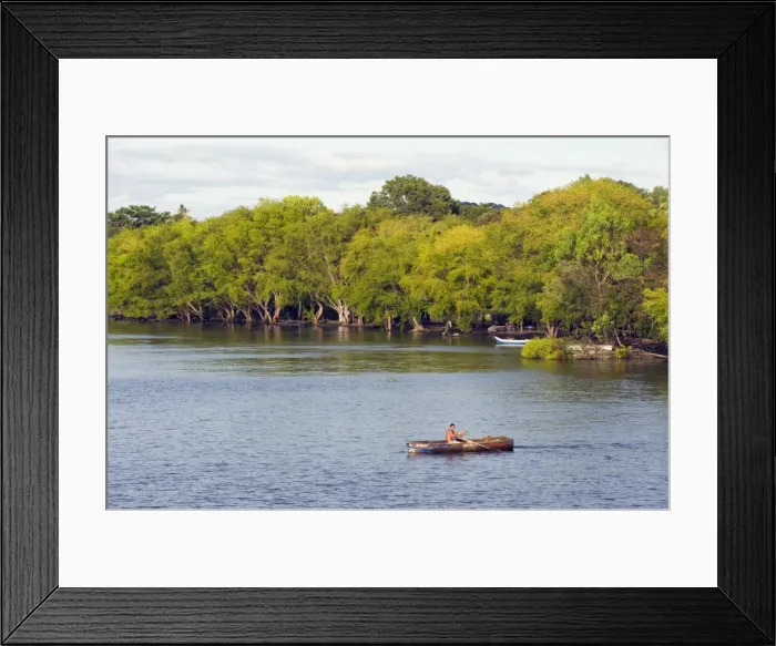 Framed Print : Man rowing a boat on Ometepe Island, Lake Nicaragua, Nicaragua, Central America Framed Print : Man rowing a boat on Ometepe Island, Lake Nicaragua, Nicaragua, Central America