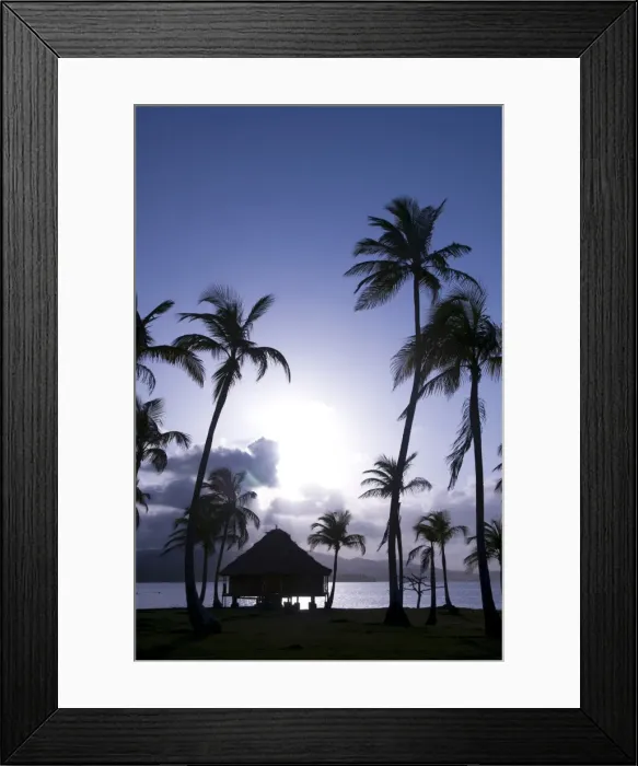 Framed Print : Hut over the water and palm trees silhouetted at sunset, Yandup Island Framed Print : Hut over the water and palm trees silhouetted at sunset, Yandup Island
