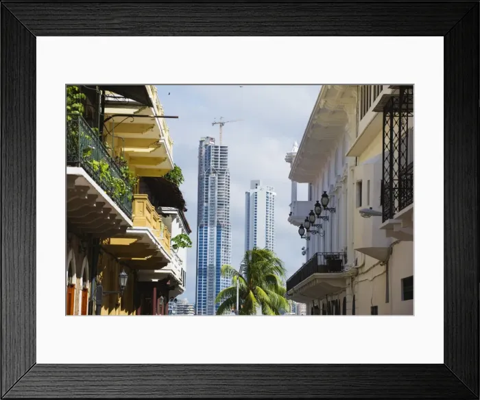 Framed Print : Modern skyscrapers and historical old town, UNESCO World Heritage Site Framed Print : Modern skyscrapers and historical old town, UNESCO World Heritage Site