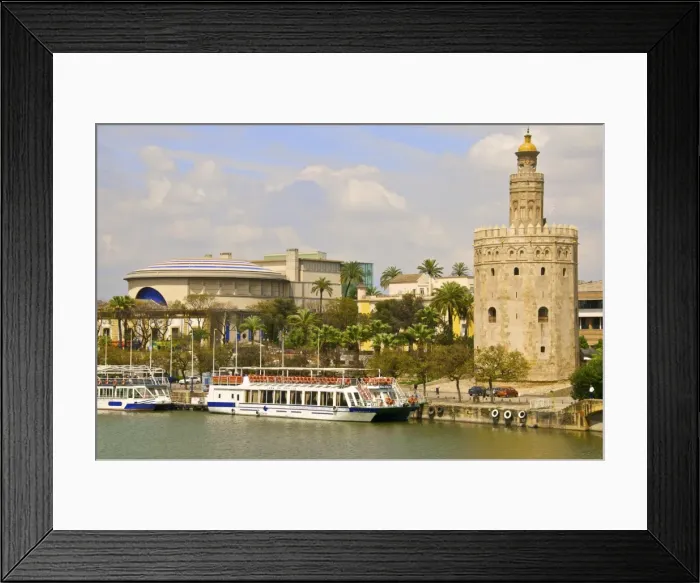 Framed Print : Tourist cruise boat on Guadalquivir river, in front of Theatro de la Maestranza Framed Print : Tourist cruise boat on Guadalquivir river, in front of Theatro de la Maestranza