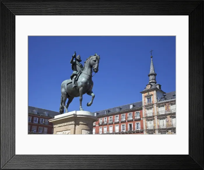 Framed Print : Casa Panaderia and equestrian statue of Felipe III in spring sunshine, Plaza Mayor Framed Print : Casa Panaderia and equestrian statue of Felipe III in spring sunshine, Plaza Mayor