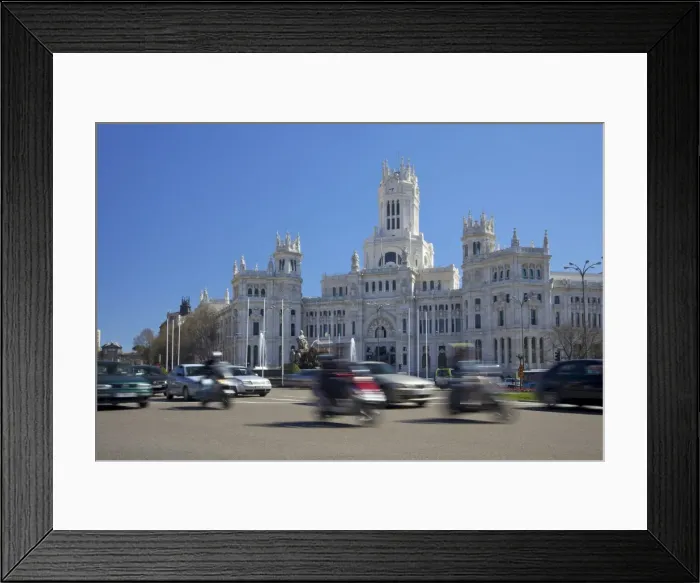 Framed Print : Traffic in Plaza de la Cibeles, Palace of Communications (Palacio de Comunicaciones) Framed Print : Traffic in Plaza de la Cibeles, Palace of Communications (Palacio de Comunicaciones)
