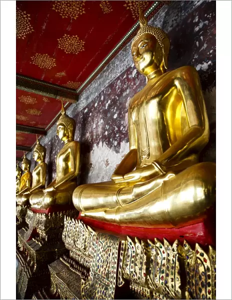 Buddha statues surrounding Wat Suthat, Bangkok, Thailand, Southeast Asia, Asia