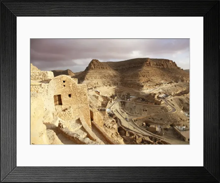 Framed Print : Granaries (ghorfas) and troglodyte dwellings at hillside Berber village of Chenini Framed Print : Granaries (ghorfas) and troglodyte dwellings at hillside Berber village of Chenini