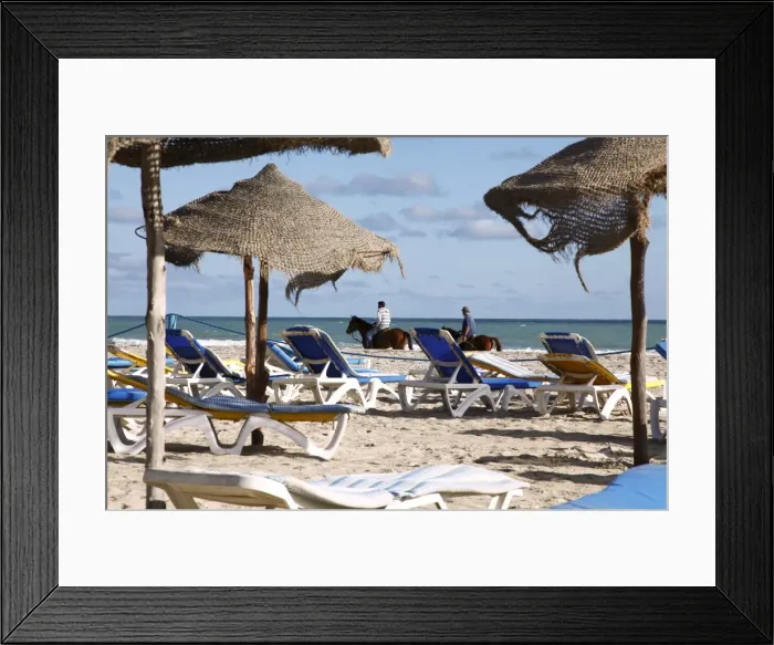 Framed Print : Beach scene on the Mediterranean coast in the tourist zone, Djerba Island Framed Print : Beach scene on the Mediterranean coast in the tourist zone, Djerba Island