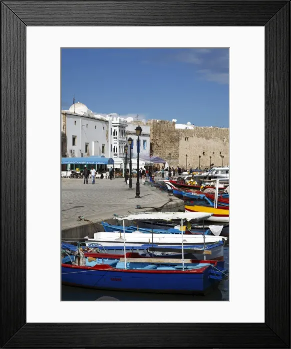 Framed Print : Fishing boats, old port canal with kasbah wall in background, Bizerte, Tunisia Framed Print : Fishing boats, old port canal with kasbah wall in background, Bizerte, Tunisia