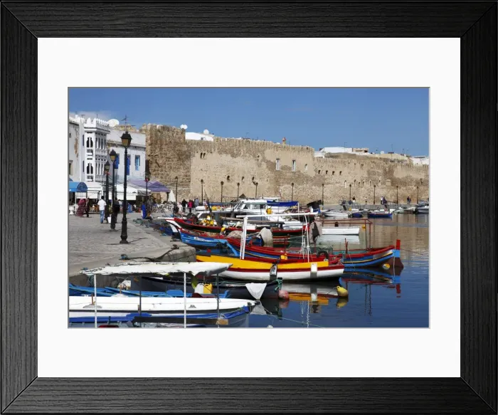 Framed Print : Old Port Canal, fishing boats and wall of the Kasbah, Bizerte, Tunisia Framed Print : Old Port Canal, fishing boats and wall of the Kasbah, Bizerte, Tunisia