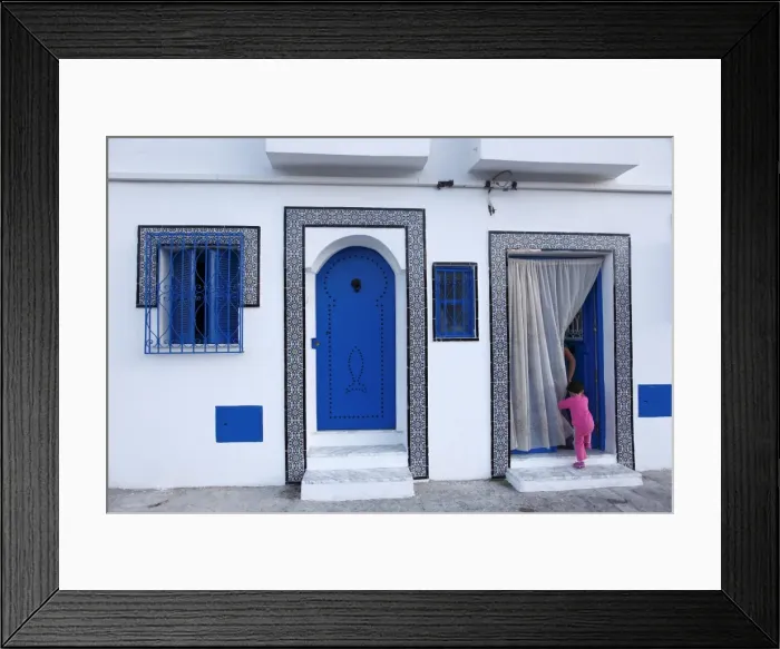 Framed Print : Young child and quayside house in the Old Port, Bizerte, Tunisia, North Africa, Africa Framed Print : Young child and quayside house in the Old Port, Bizerte, Tunisia, North Africa, Africa