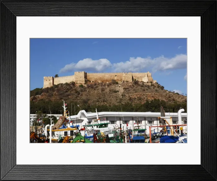 Framed Print : The 6th century Byzantine Fortress overlooking fishing boats in the harbour Framed Print : The 6th century Byzantine Fortress overlooking fishing boats in the harbour