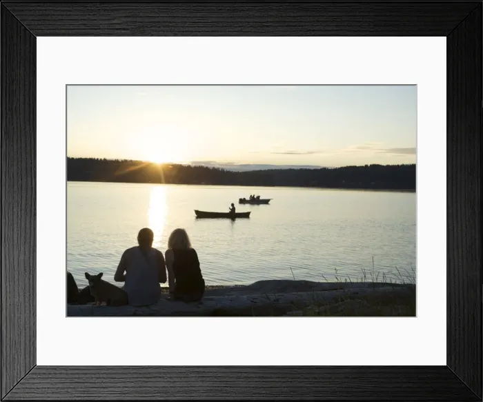 Framed Print : Silhouette of couple with dog watching sunset at Lisabeula Beach, Vashon Island