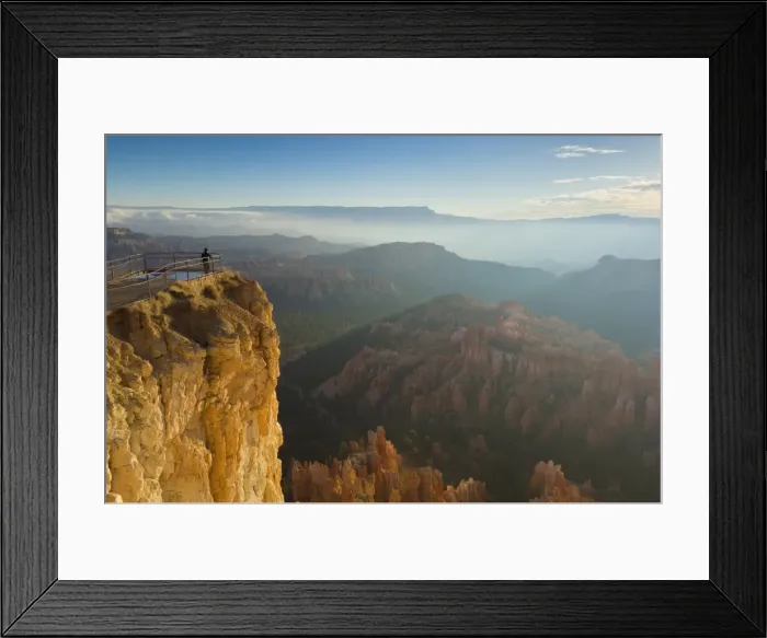 Framed Print : Tourist watching the sunrise with low mist over the sandstone hoodoos in Bryce Amphitheater Framed Print : Tourist watching the sunrise with low mist over the sandstone hoodoos in Bryce Amphitheater