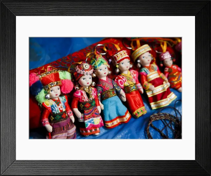 Framed Print : Dolls of H mong women in traditional tribal dress, Can Cau Market, Vietnam Framed Print : Dolls of H mong women in traditional tribal dress, Can Cau Market, Vietnam