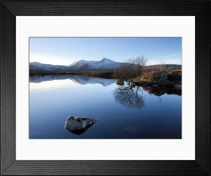 Framed Print : Dusk view of snow-covered Black Mount Hills and their reflection in the flat calm Lochain na h Achlaise, Rannoch Moor, Highland, Scotland, United