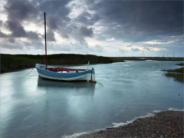 A moody and windy summer evening at Brancaster Staithe, North Norfolk, England