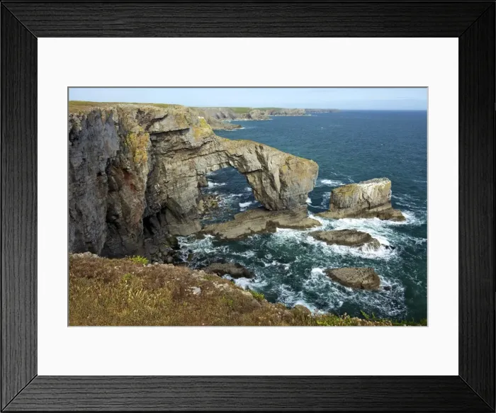 Framed Print : Green Bridge of Wales, natural rock arch, spring evening sunshine, Pembrokeshire Coast National Park, Wales, United Framed Print : Green Bridge of Wales, natural rock arch, spring evening sunshine, Pembrokeshire Coast National Park, Wales, United