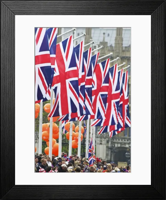 Framed Print : Union flags and spectators outside Houses of Parliament, during the marriage of Prince William to Kate Middleton, 29th April 2011, London, England, United Framed Print : Union flags and spectators outside Houses of Parliament, during the marriage of Prince William to Kate Middleton, 29th April 2011, London, England, United