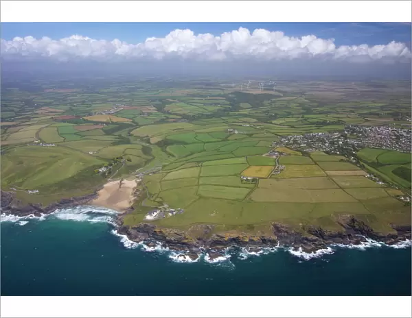 Aerial view of Poldhu Cove and Mullion, looking east to Goonhilly, Lizard Peninsula